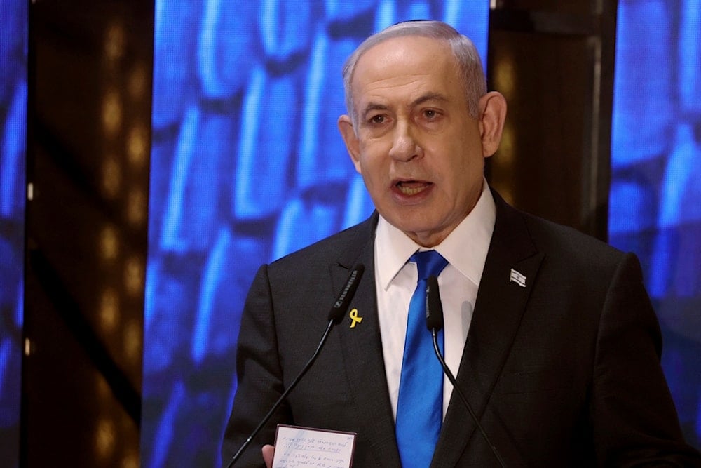 Israeli Prime Minister Benjamin Netanyahu addresses a ceremony at a military cemetery on May 13, 2024 (AP)