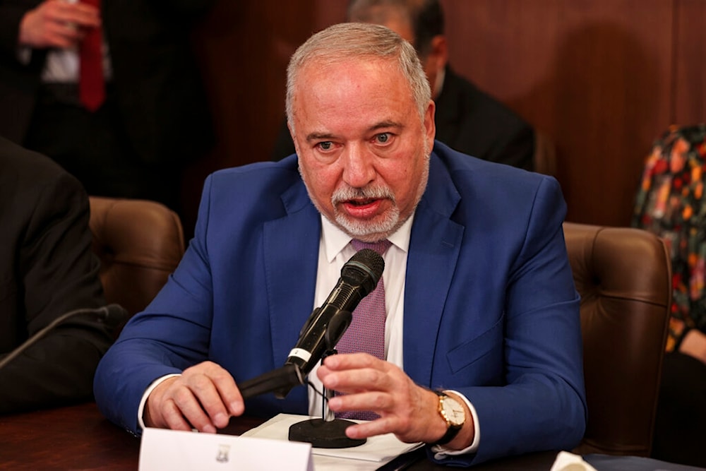 Avigdor Lieberman speaks at the weekly cabinet meeting, at the Prime Minister's office in occupied al-Quds, Sunday, Feb. 13, 2022 (AP)