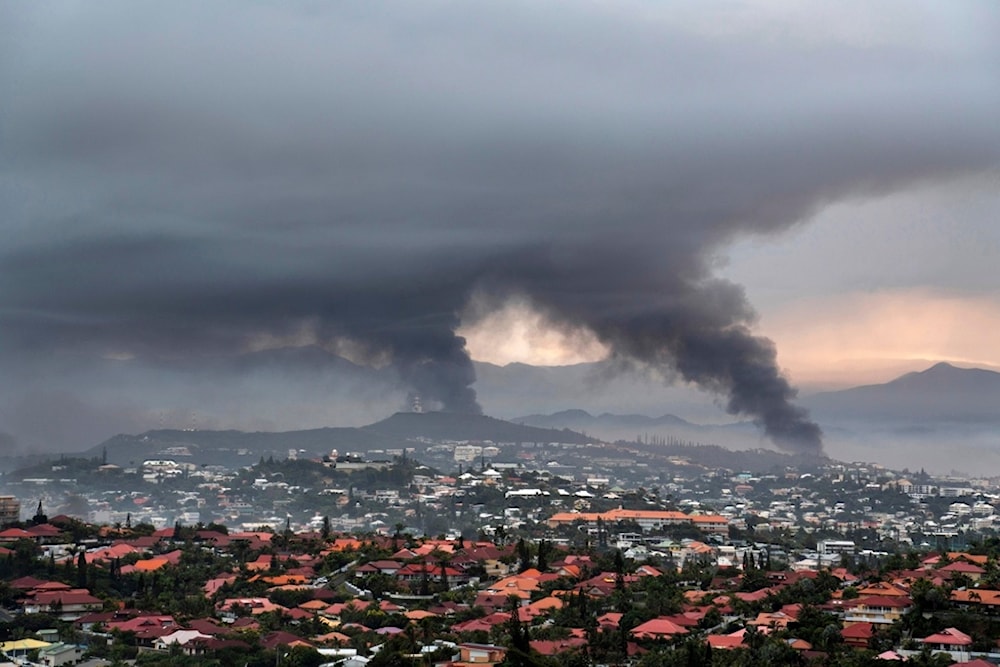  Smoke rises during protests in Noumea, New Caledonia, Wednesday May 15, 2024. (AP)