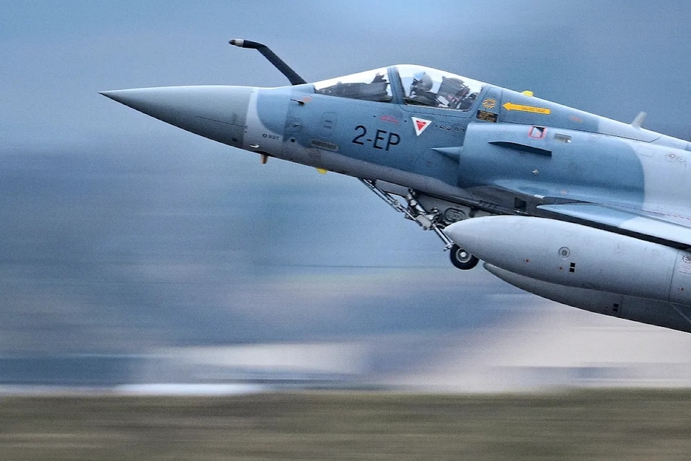 A Mirage 2000-5F jet fighter takes off from Luxeuil-Saint Sauveur air-base 116, in Saint-Sauveur, France, on March 13, 2022. (AFP)