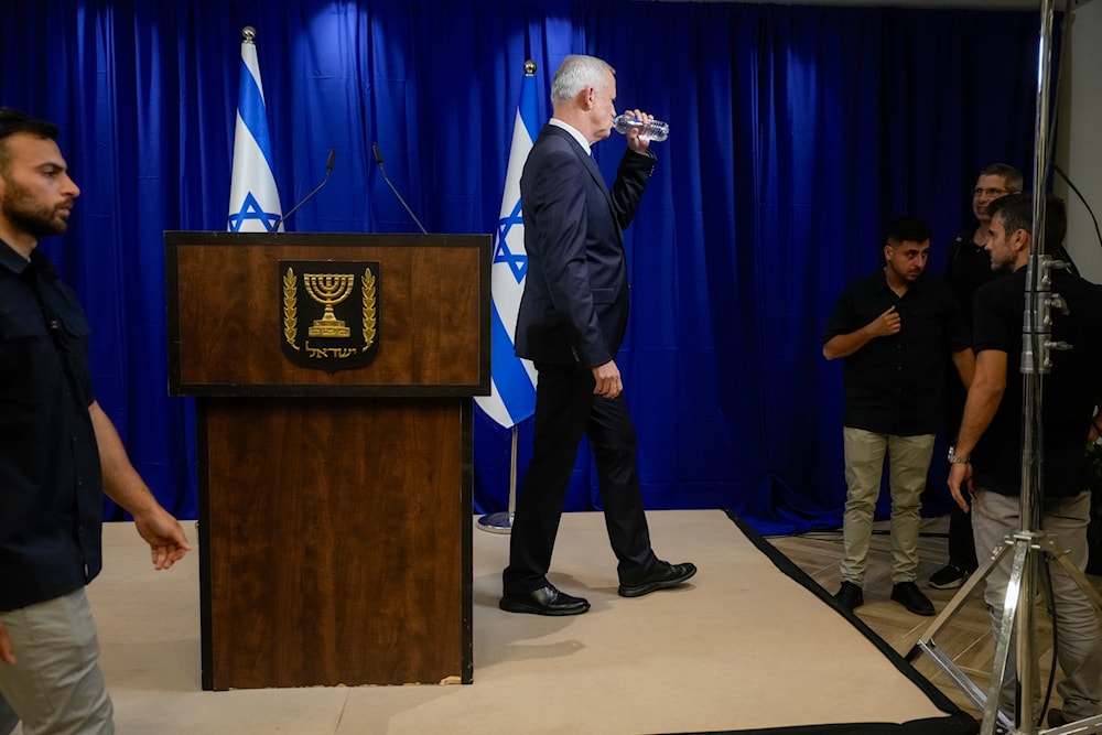 Israeli War Cabinet Benny Gantz as he leaves after announcing his resignation in Ramat Gan, occupied Palestine, June 9, 2024 (AP)