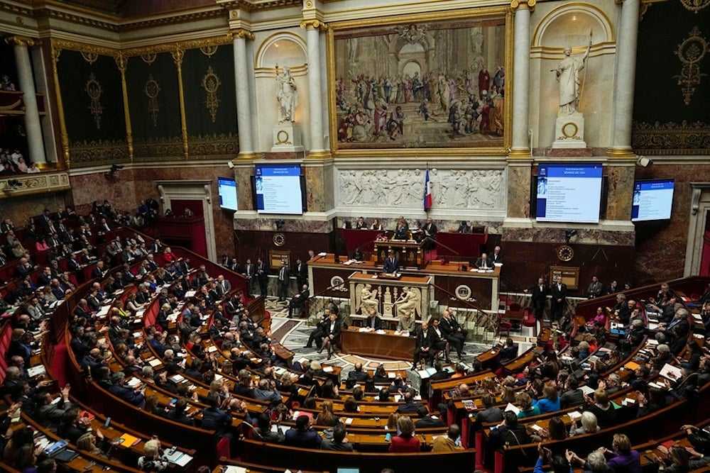 Lawmakers gather at the National Assembly, Tuesday, Jan. 30, 2024 in Paris. (AP)