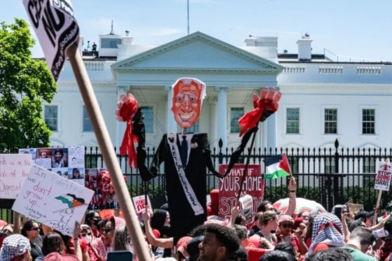 Pro-Palestinian demonstrators rally outside the White House in Washington, D.C., on Saturday to protest against Israeli genocide in Gaza. (AFP / Getty Images)