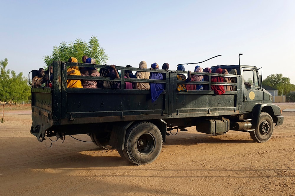 Women and children who were held captive by islamic extremists, and rescued by Nigeria's army, are seen upon arrival in Maiduguri, Nigeria, on May 20, 2024. (AP)