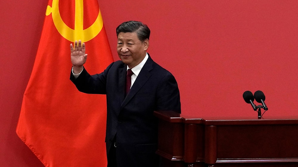 Chinese President Xi Jinping gestures at a 2022 event to introduce new members of the Politburo Standing Committee at the Great Hall of the People in Beijing. undated. (AP)