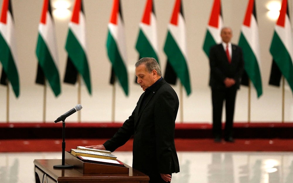 Nabil Abu Rudeineh being sworn in as deputy prime minister of the Palestinian Authority, in Ramallah, April 13, 2019. (AFP)