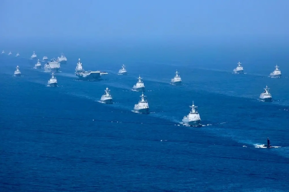 Chinese state media released this photo from the country’s largest naval exercises in decades, carried out in May of Hainan Island. (Xinhua, via Associated Press)