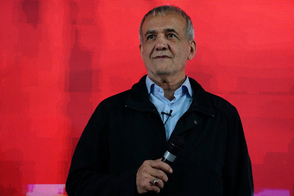 Iran's President-elect Masoud Pezeshkian addresses a campaign meeting in Tehran, Iran, Friday, June 14, 2024. (AP)