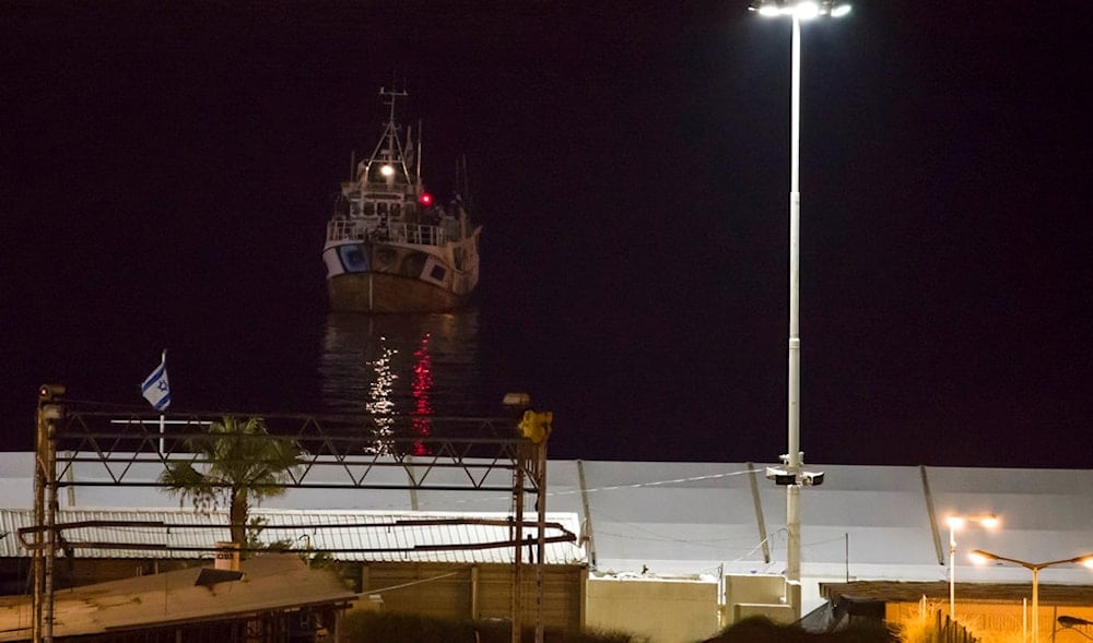 A boat bound to Gaza Strip intercepted by Israeli navy arrives to Ashdod port, occupied Palestine, Sunday, July 29, 2018. (AP)