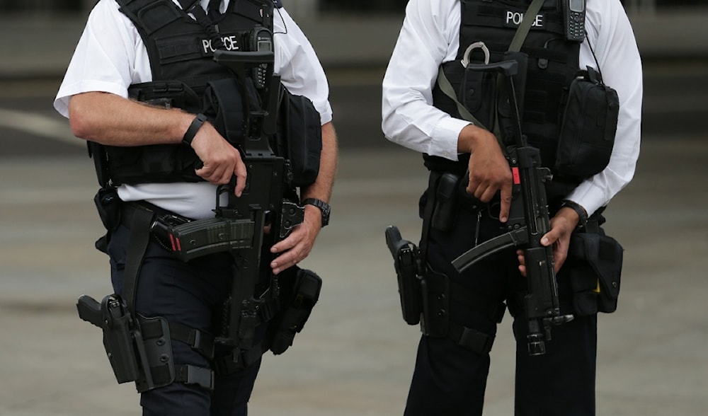 Armed police personnel patrol near London's Trafalgar Square on August 4, 2016. (AFP)