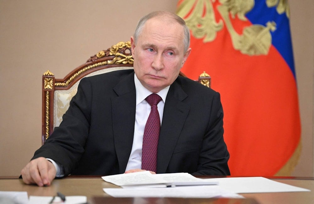 Russian President Vladimir Putin chairs a government meeting via videoconference from the Kremlin, July 19, 2023. (AFP)