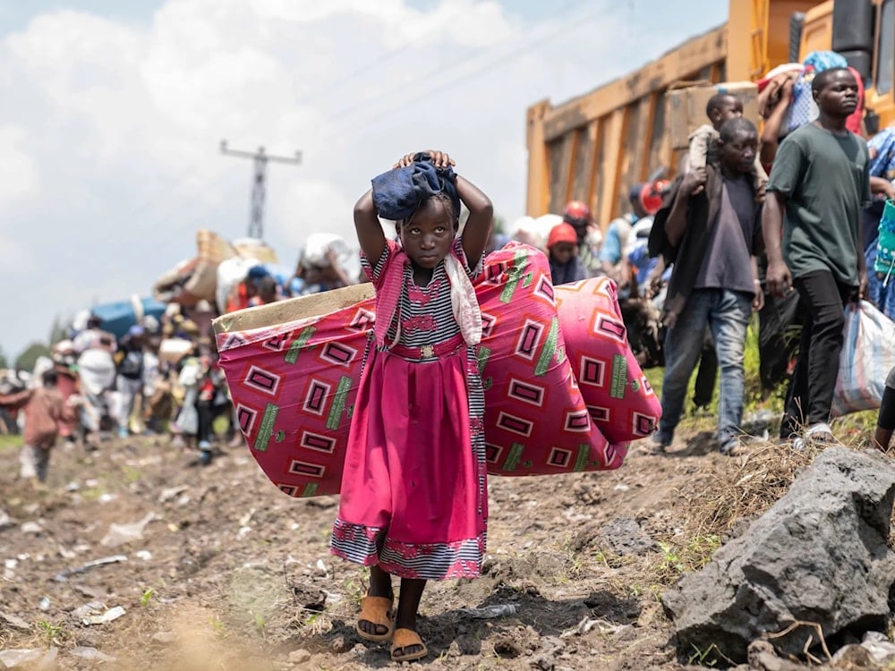 Thousands fleeing the continuing conflict between government forces and M23 rebels have sought shelter in the city of Goma (AP)