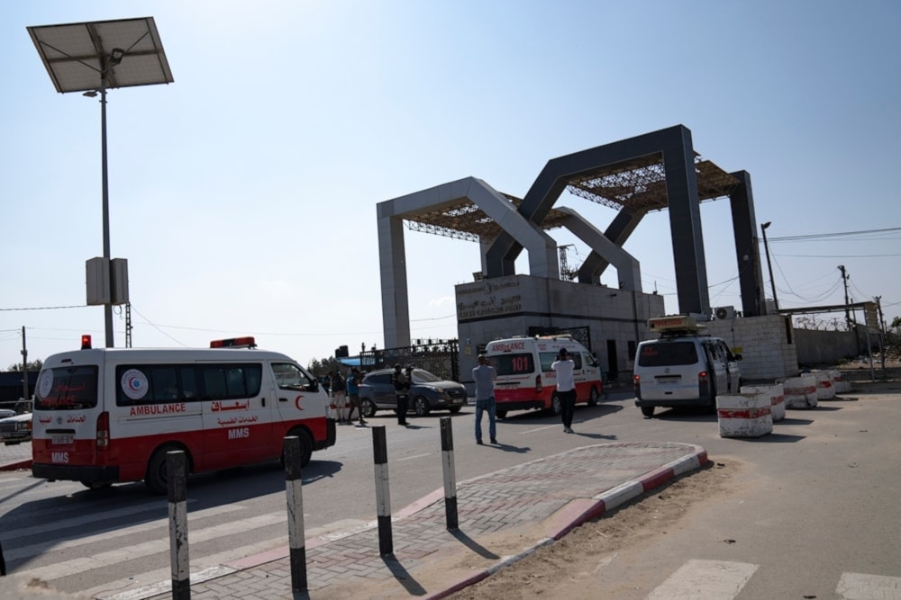 Ambulances with Palestinians injured in the Israeli bombardment of the Gaza Strip arrive at the Rafah border crossing to Egypt Wednesday, November 1, 2023. (AP)