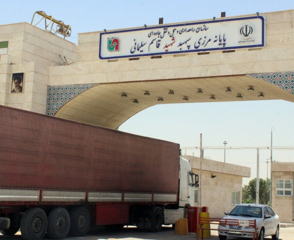 This undated photo published by IRNA shows a truck passing through the Mehran crossing at the Iraq-Iran border. (IRNA)