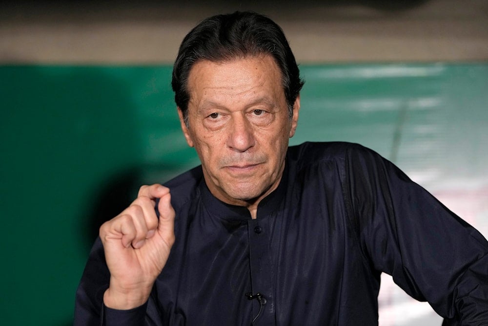 Pakistan's former Prime Minister Imran Khan gives a press conference at his home, in Lahore, Pakistan, on May 18, 2023. (AP)