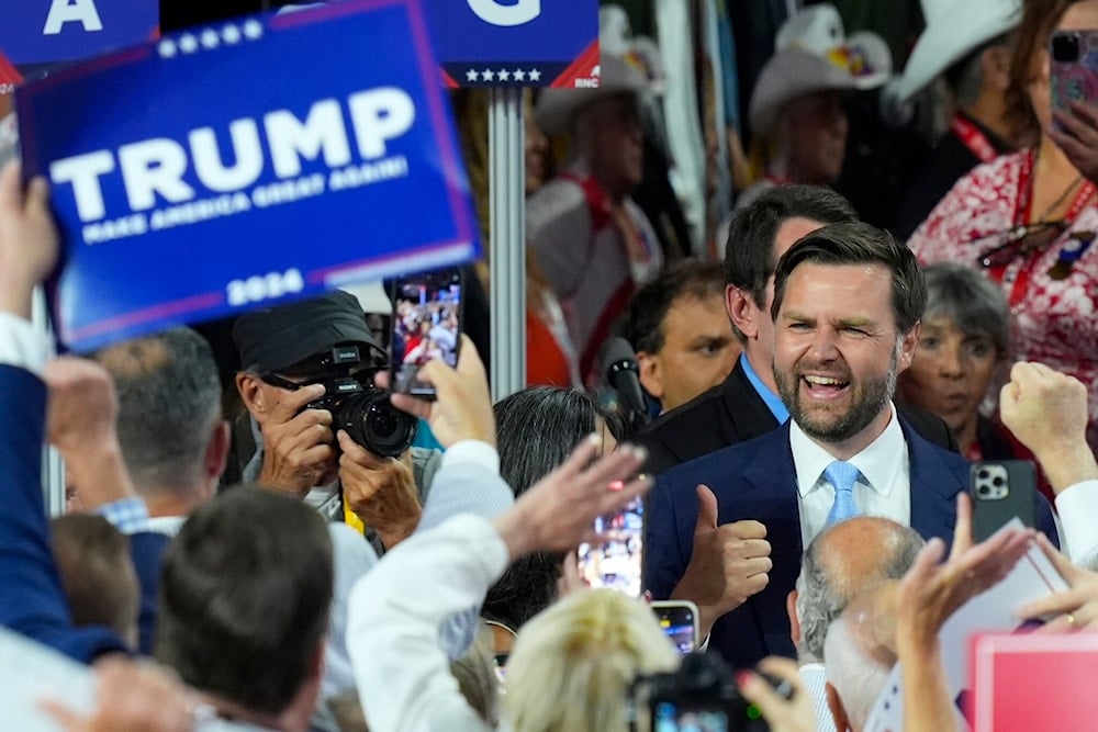 Republican US vice presidential candidate Senator JD Vance gives a thumbs-up to supporters as he is introduced during the first day of the Republican National Convention on July 15, 2024, in Milwaukee. (AP)