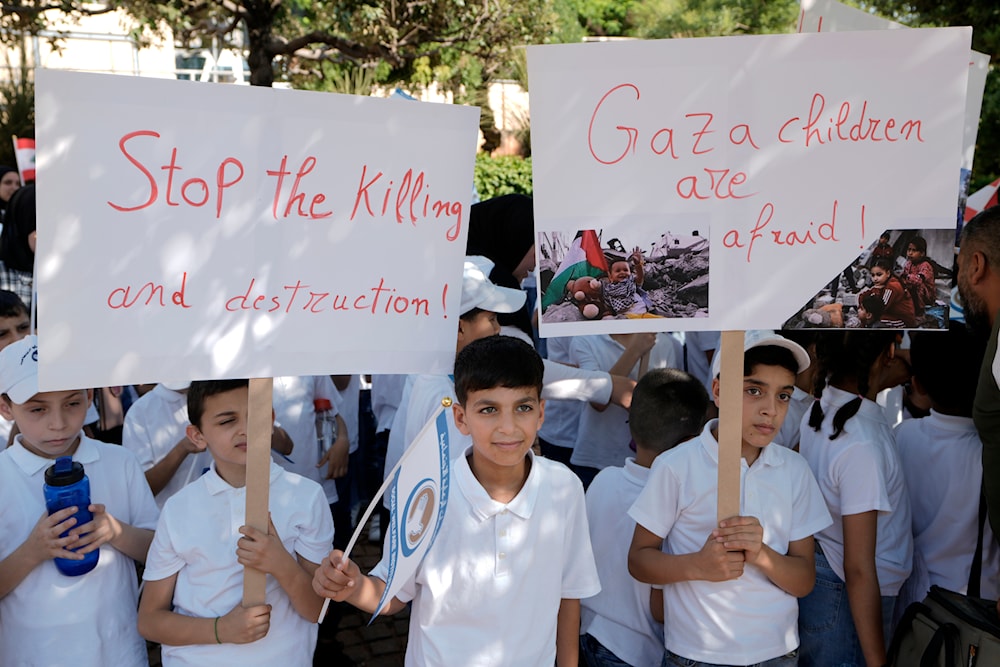 Students of Dar Al Aytam Al Islamiya protest to show support for Palestinians in the Gaza Strip, in front of the headquarters of U.N. ESCWA in Beirut, Lebanon, Tuesday, June 11, 2024. (AP)