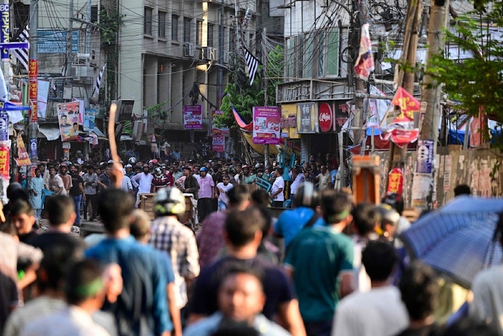 Anti-quota protesters and students backing the ruling Awami League party clash in Dhaka on July 16, 2024. (AFP)