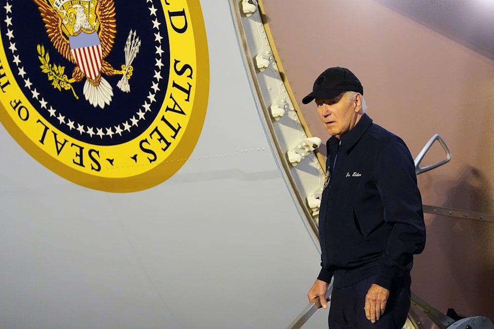 President Joe Biden walks down the steps of Air Force One at Dover Air Force Base in Delaware, Wednesday, July 17, 2024 (AP)