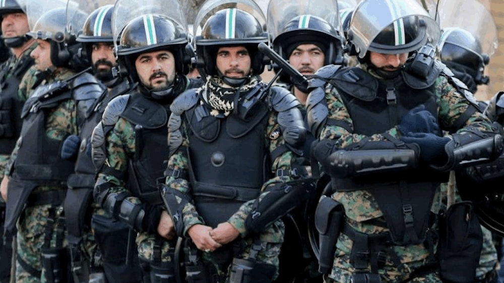 A file picture shows Iranian security forces standing guard in the capital Tehran, January 12, 2020. (AFP)