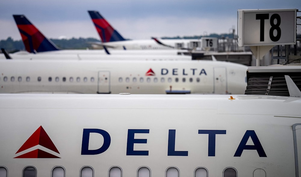 Delta Airlines planes sit parked at Hartsfield-Jackson Atlanta International Airport in Atlanta, Georgia, June 28, 2024. (AFP)