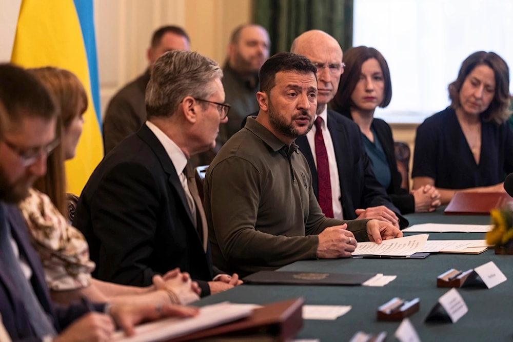 Ukrainian President Volodymyr Zelenskyy addresses an extraordinary meeting of the UK Cabinet at 10 Downing Street in London, Friday July 19, 2024. (Richard Pohle/Pool Photo via AP)