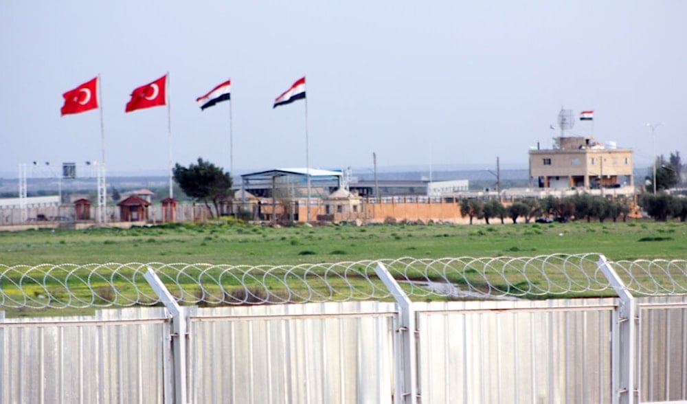 In this photo taken Tuesday, April 10, 2012, the border crossing between Turkey and Syria is seen from a refugee camp near the border, in Kilis , Turkey. (AP)