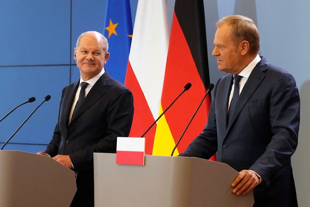 German Chancellor Olaf Scholz, left, and Polish Prime Minister Donald Tusk attend a press conference after German-Polish inter-governmental consultations in Warsaw, Poland, Tuesday, July 2, 2024. (AP)