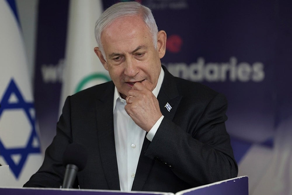 Israeli occupation Prime Minister Benjamin Netanyahu speaks during a news conference in occupied Palestine, on Saturday, June 8, 2024. (AP)