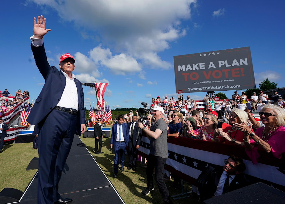 Republican presidential candidate former President Donald Trump waves to the crowd at a campaign rally in Chesapeake, Va., on June 28, 2024. (AP)