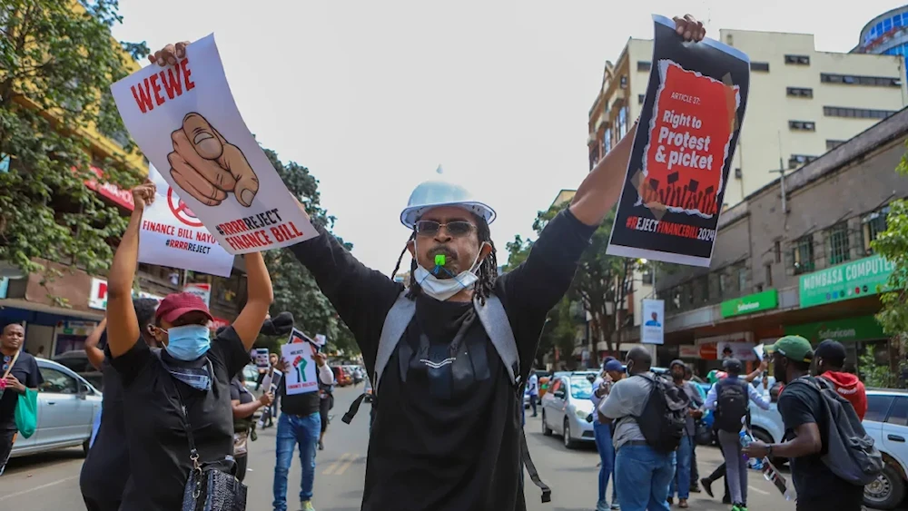 Demonstrators protest against Kenya's controversial finance bill in Nairobi on June 18, 2024. (AP)