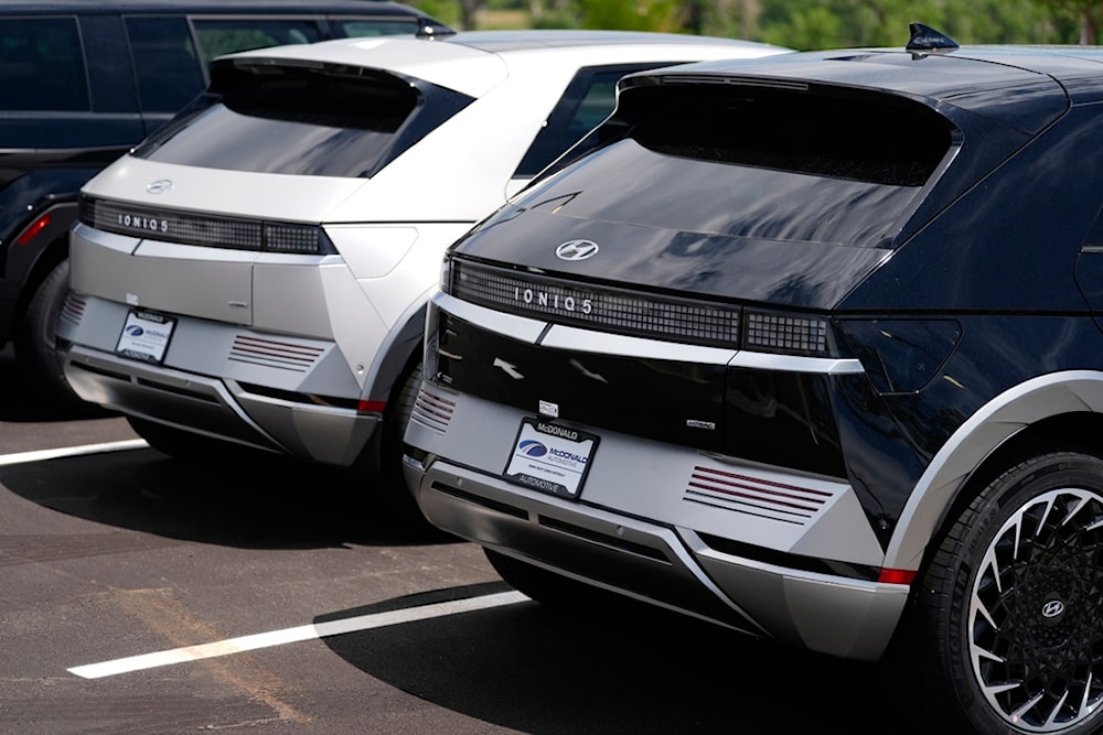 Unsold 2024 Ioniq 5 electric vehicles sit on display at a Hyundai dealership Sunday, June 30, 2024, in Highlands Ranch, Colo. (AP Photo/David Zalubowski)