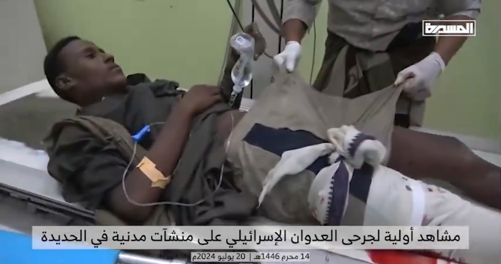 A Yemeni civilian is pictured with a bloodied leg at a hospital near Hodeidah. (Screengrab from Al Masira)