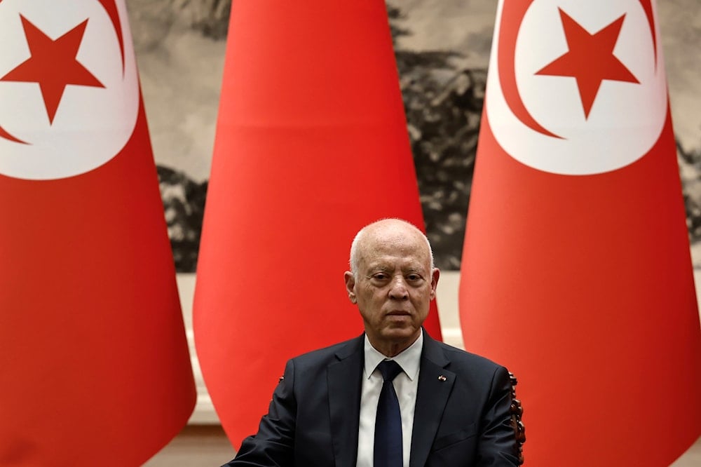 Tunisian President Kais Saied attends a signing ceremony with Chinese President Xi Jinping at the Great Hall of the People in Beijing, on May 31, 2024. (AP)