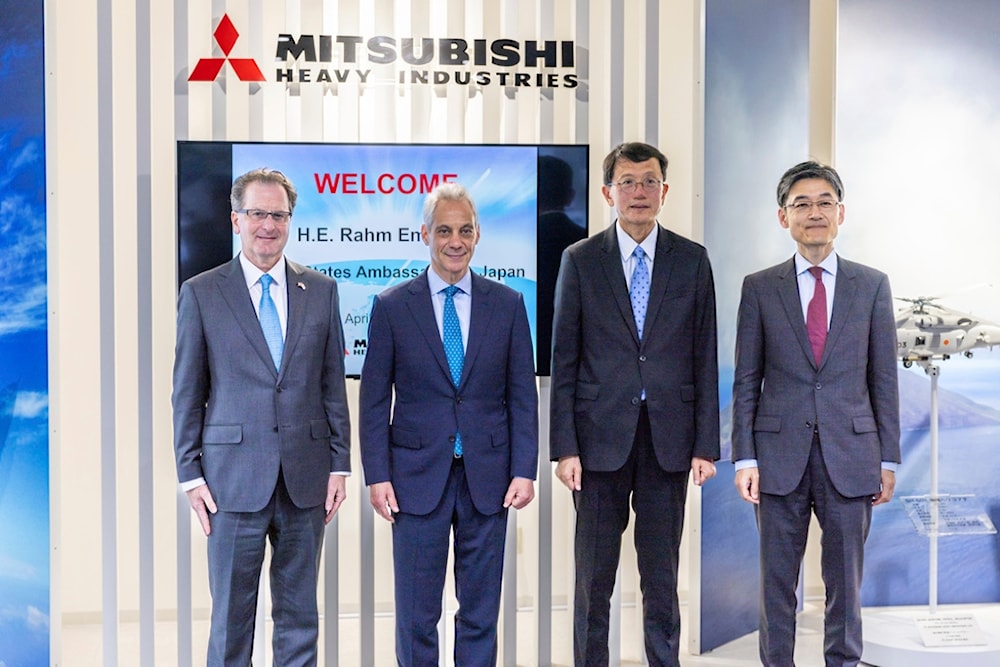 US Ambassador to Japan, Rahm Emanuel, poses with the officials of Mitsubishi Heavy Industries (MHI) and Lockheed in the town of Toyoyama in the Aichi prefecture, Japan, April 16, 2024.(US Embassy/AP)