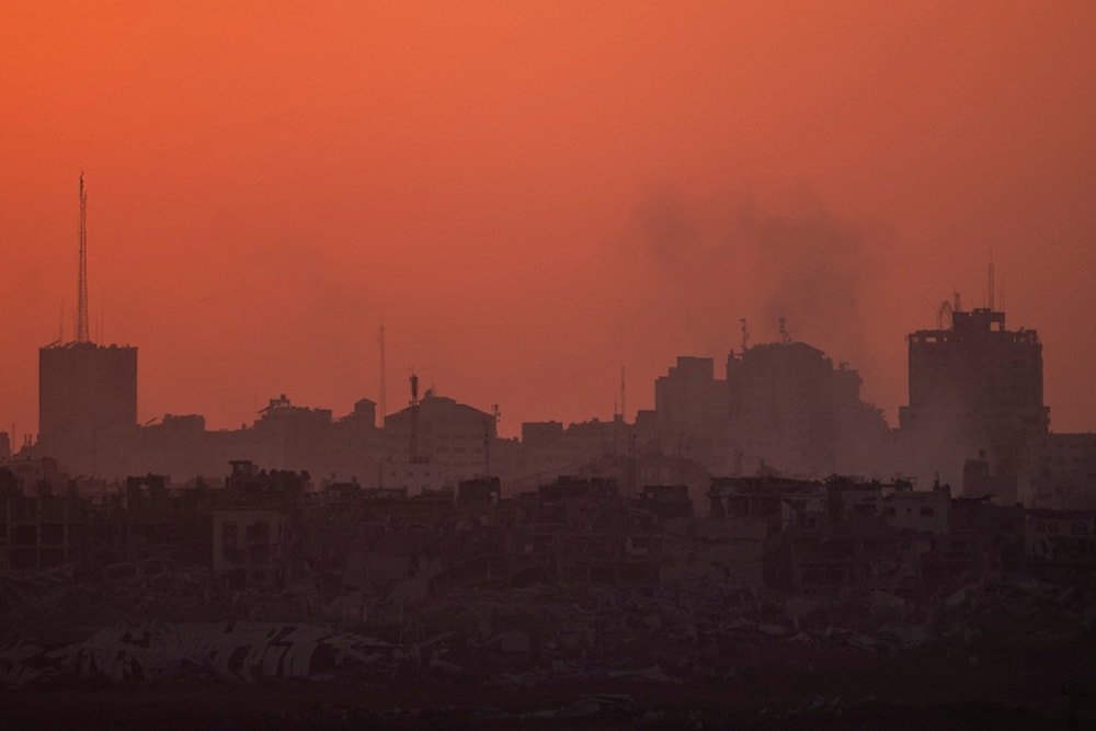 Destroyed buildings stand in the Gaza Strip during the sunset, Wednesday, July 17, 2024. (AP Photo/Leo Correa)