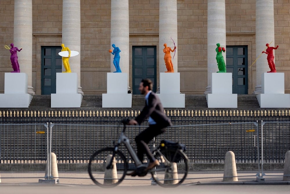 Copies of one of the most famous Greek statues, the Venus of Milo, stand on the steps of the French National Assembly ahead of the 2024 Summer Olympics, Friday, July 19, 2024 in Paris. (AP)