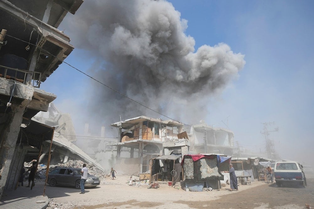 Smoke rises following Israeli bombardments in Khan Younis, Gaza Strip, Monday, July 22, 2024. (AP Photo/Abdel Kareem Hana)