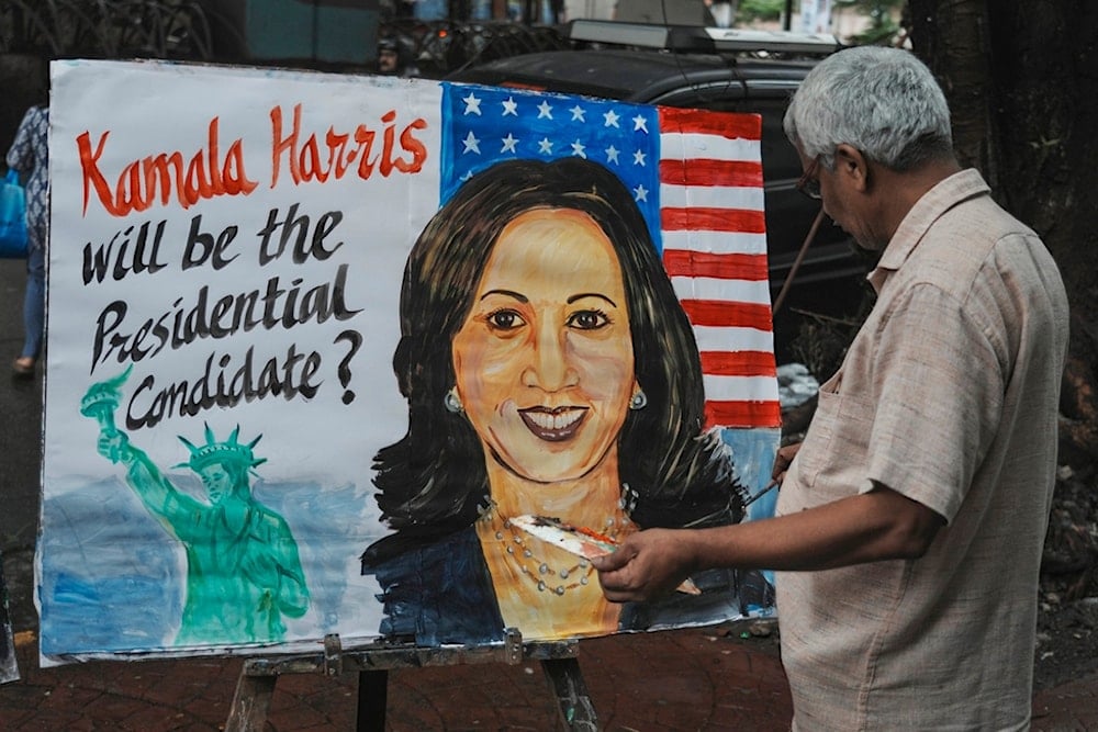 Indian art teacher Prithvi Raj Kambli, makes painting of US. Vice President Kamala Harris, in Mumbai, India, Monday, July 22, 2024. (AP Photo/Rafiq Maqbool)