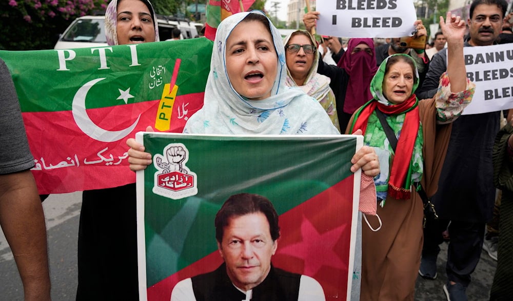 Supporters of former Prime Minister Imran Khan's party Pakistan Tehreek-e-Insaf ask for the release of Khan during a protest in Lahore, Pakistan, Sunday, July 21, 2024. (AP)