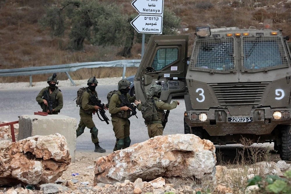 Israeli occupation soldiers near the West Bank city of Tulkarm where two Palestinians were reportedly killed by Israeli forces on October 5, 2023. (AFP)