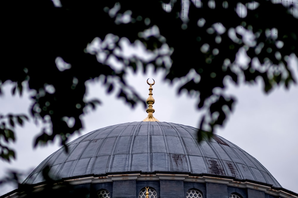 A crescent moon marks the top of the roof dome of the Sehitlik Mosque in Berlin, Germany, Thursday, June 29, 2023. (AP)