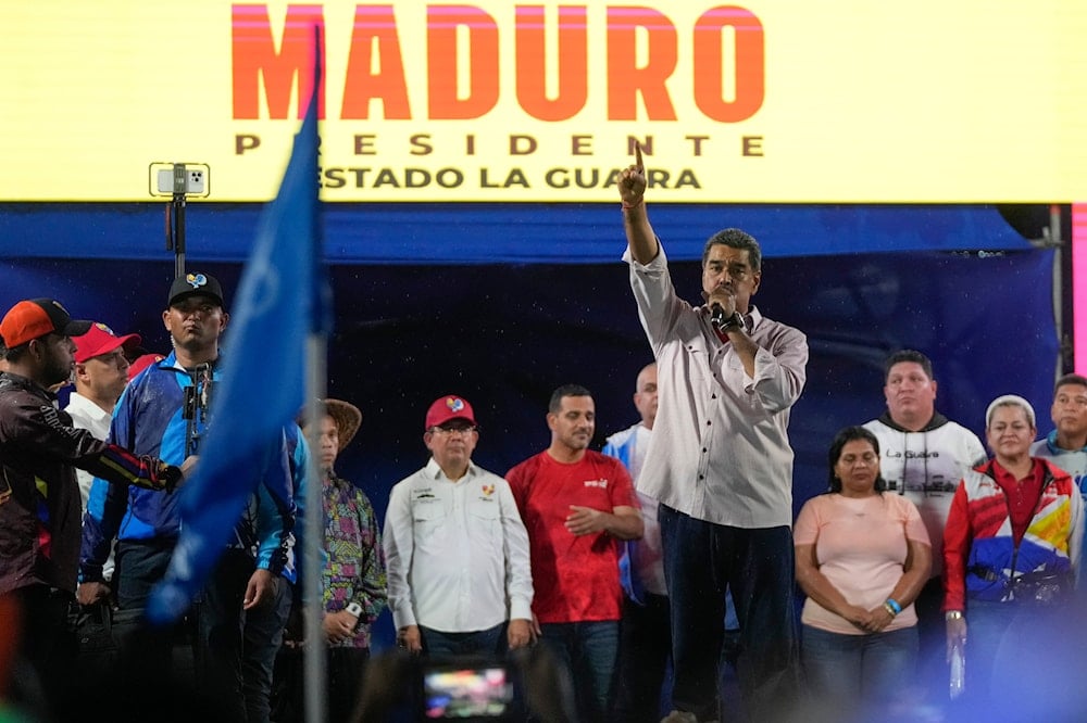 Venezuelan President Nicolas Maduro speaks to supporters during a campaign rally in La Guaira, Venezuela, on July 22, 2024. (AP)