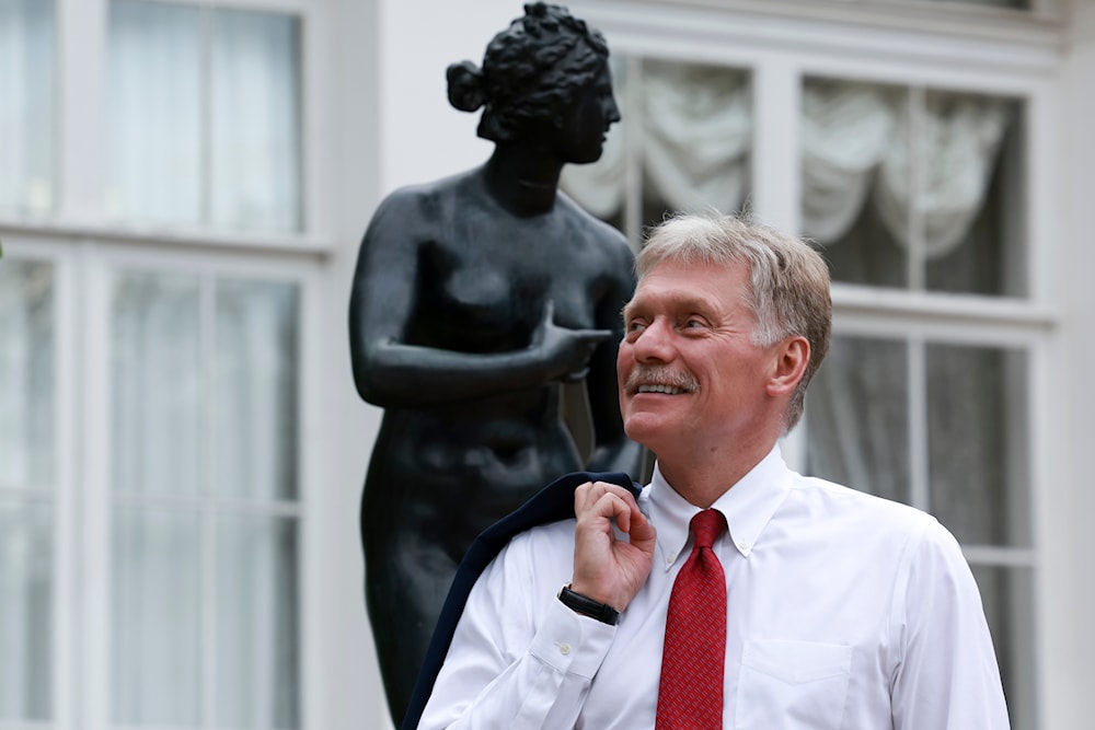 Kremlin spokesman Dmitry Peskov visits the Oranienbaum Palace and park complex in St. Petersburg, Russia, Thursday, July 11, 2024. (AP)