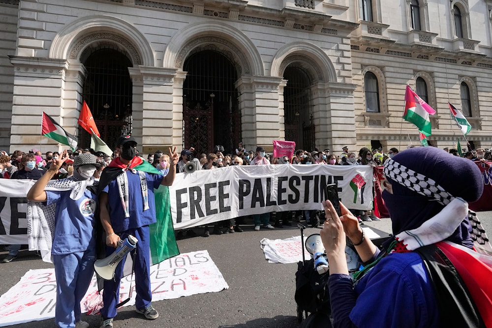 Workers and trade unionists from Workers for a Free Palestine blockade the Foreign, Commonwealth and Development Office (FCDO) in central London, on July 24, 2024. (AP)