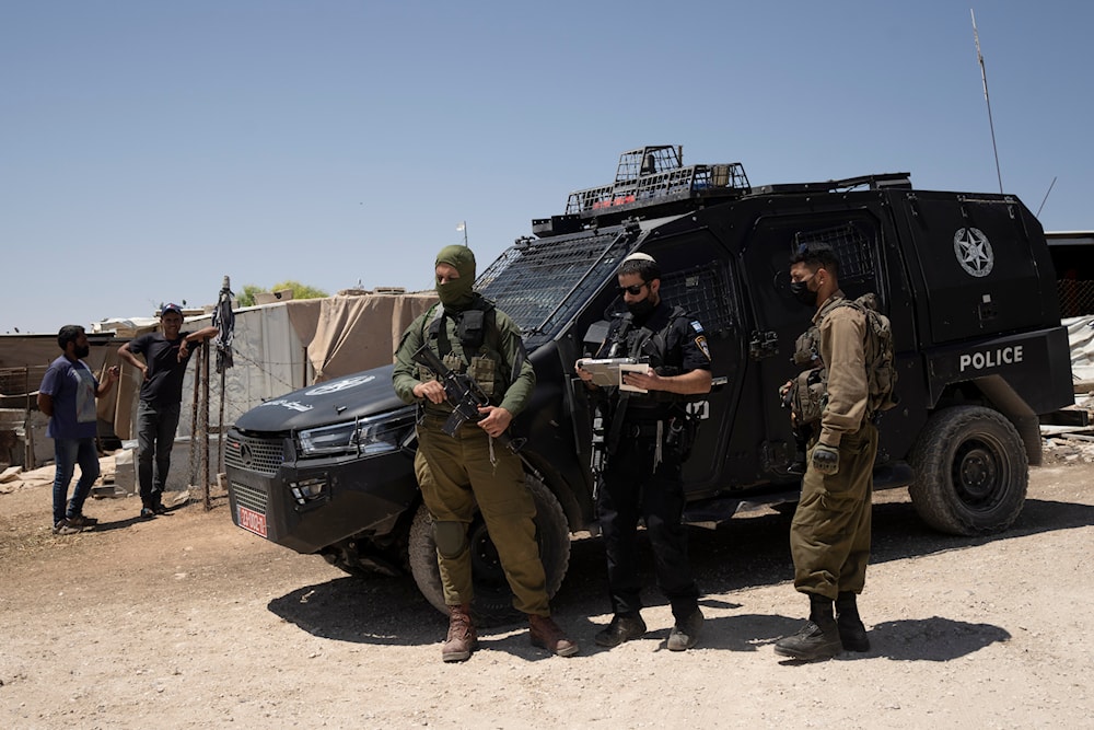 Israeli occupation forces in the occupied West Bank village of Umm al-Khair, occupied Palestine, July 10, 2024 (AP)