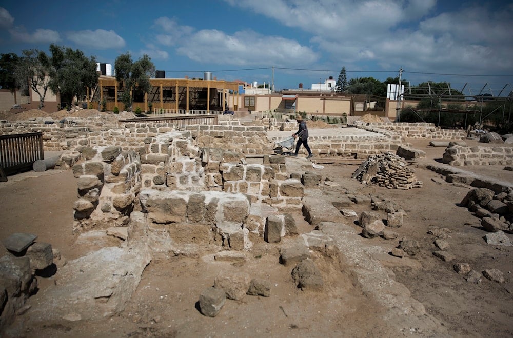 In this July 14, 2019 photo, Palestinians work on a 4th century AD St. Hilarion monastery archaeological site in central Gaza Strip. (AP)