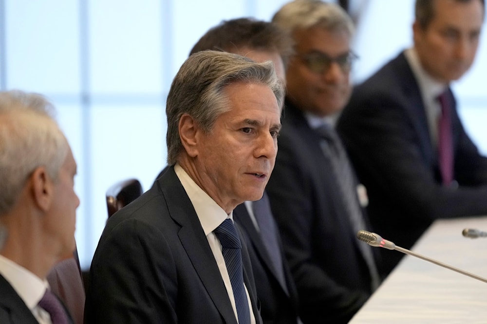 U.S. Secretary of State Antony Blinken, center, talks with Japanese Foreign Minister Yoko Kamikawa during a bilateral meeting at the Foreign Ministry's Iikura guesthouse in Tokyo, Sunday, July 28, 2024. (AP)