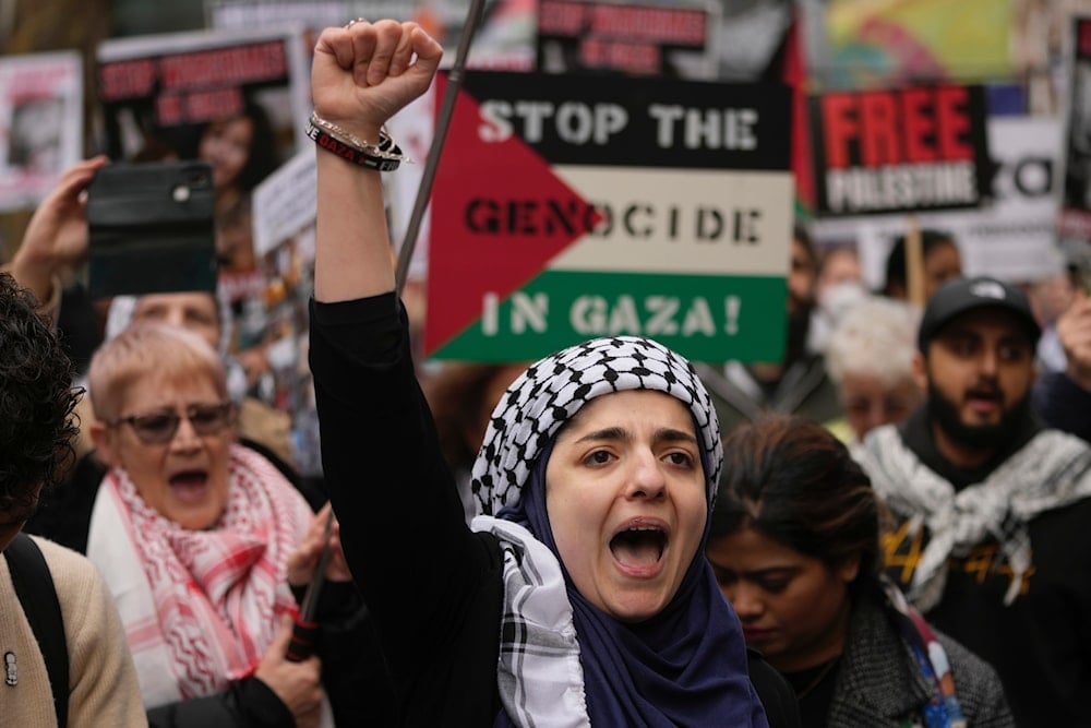 Pro-Palestinian protesters take part in a demonstration on Al Quds Day, in London, the United Kingdom, April 5, 2024 (AP)