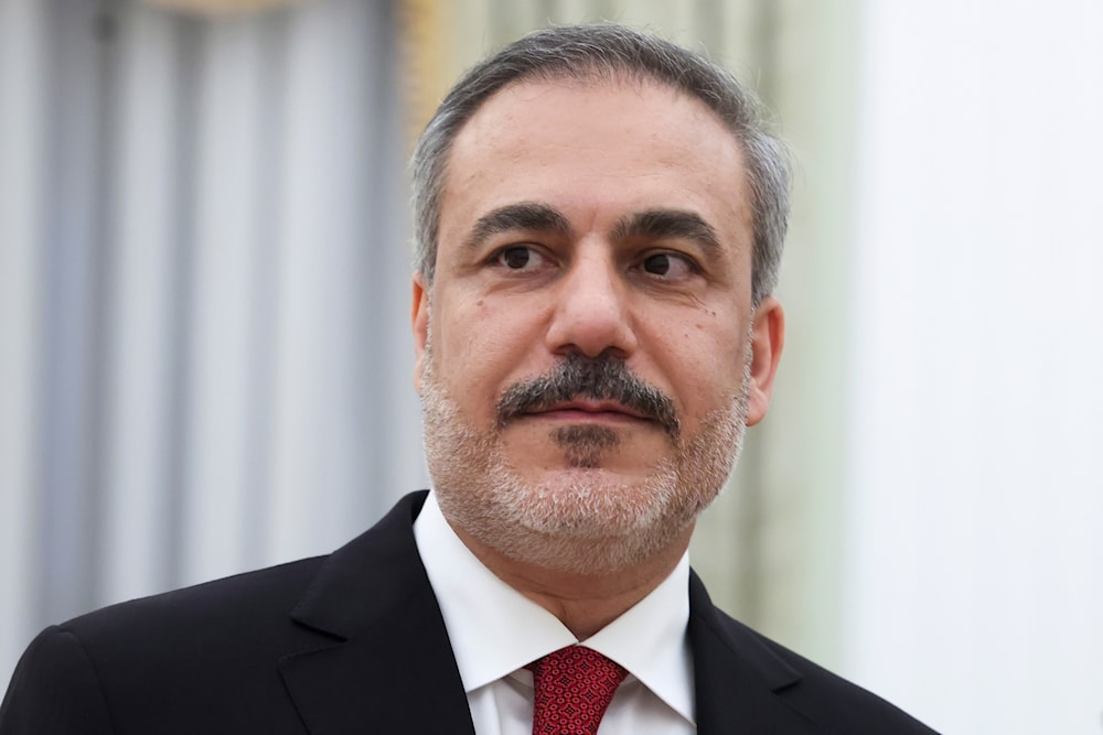 Turkish Foreign Minister Hakan Fidan waits for a meeting with Russian President Vladimir Putin at the Kremlin in Moscow, Russia, on June 11, 2024. (AP)